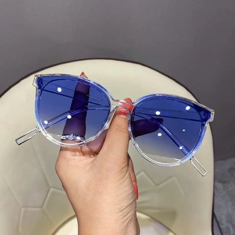 Gafas de sol de marca de moda Diseñador Lentes femeninos Anti-Reflejos UV400