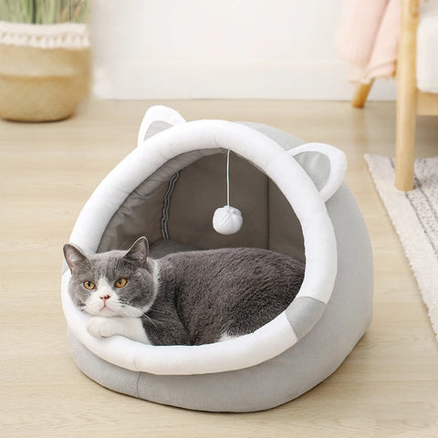 Bed for cats or small dogs with washable cushion