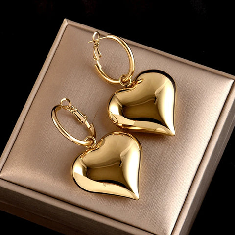 Pendientes de corazón asimétricos color dorado o plateado grandes