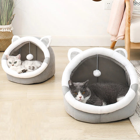 Bed for cats or small dogs with washable cushion