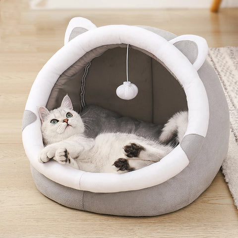 Bed for cats or small dogs with washable cushion