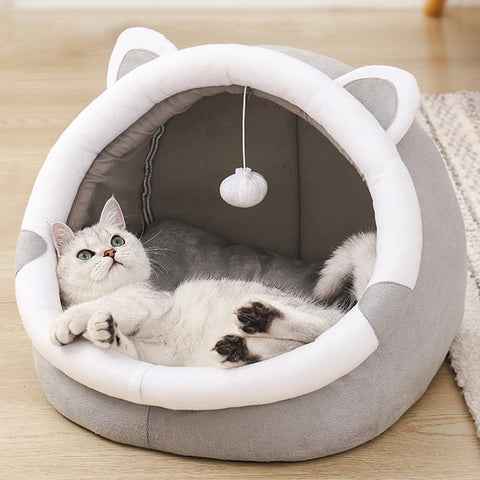 Bed for cats or small dogs with washable cushion