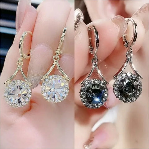 Pendientes largos de circonitas con piedra cristal.